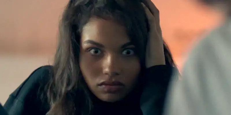 Aisha in Don't Look Deeper looking shocked