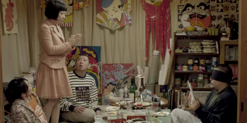 A playful scene from Fukuchan of Fukufuku Flats where Fuku-chan is playing a game with his friends