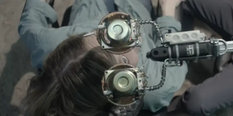 A scene from Pasture showing Sarah about to undergo a strange, experimental procedure